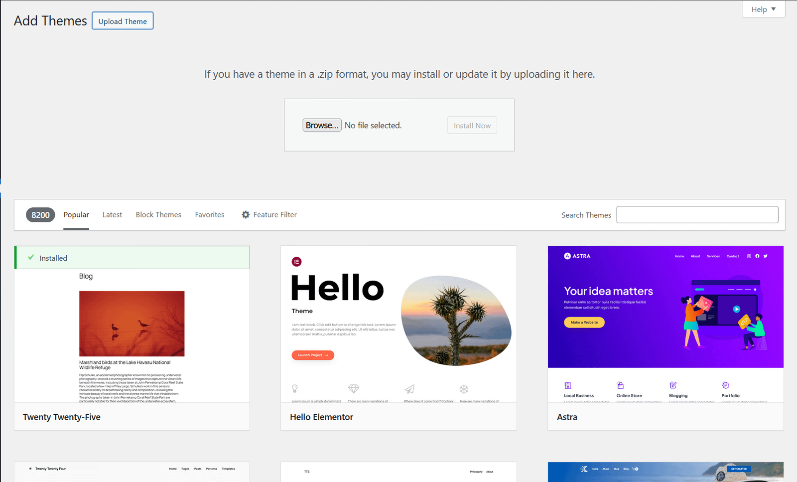 WordPress Add Themes screen showing Upload Theme button and file browser for installing a theme from a zip file